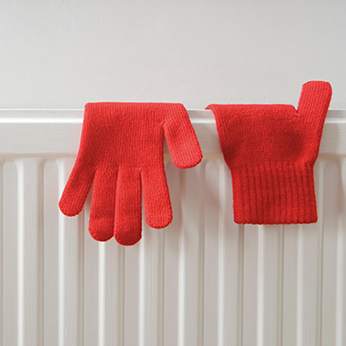 Gloves drying on a radiator
